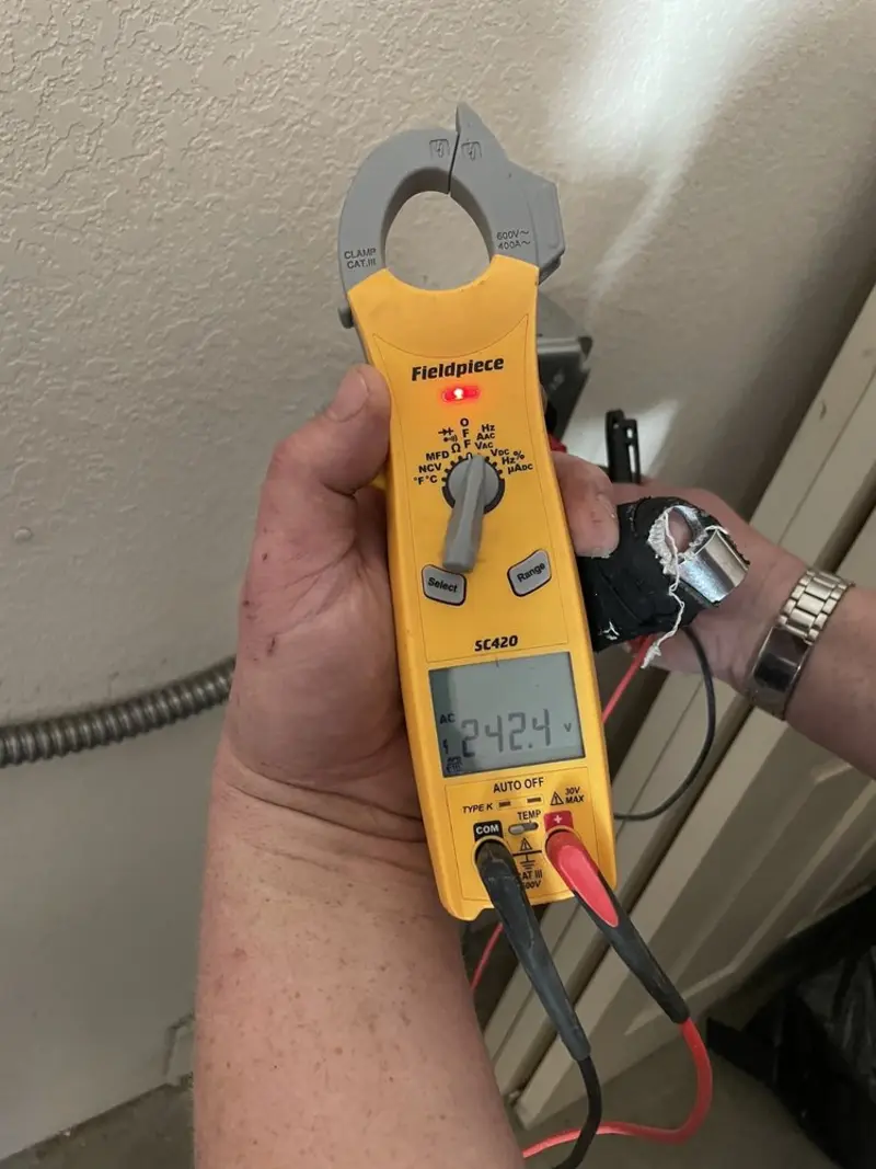 Voltage testing with clamp meter during Aluminum Wiring Replacement in Kemah